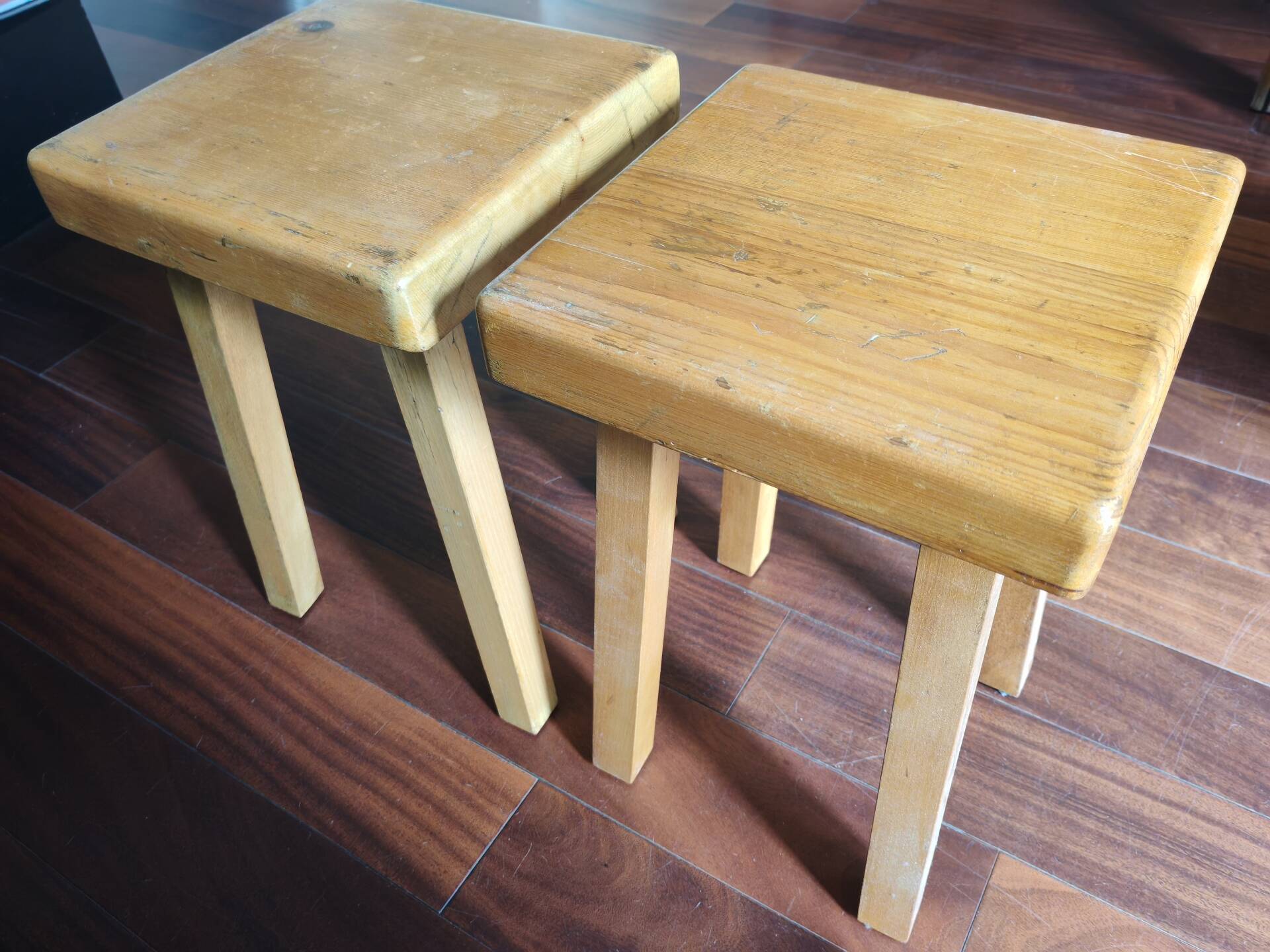 1 set of 2 solid pine stools by Charlotte Perriand, Les Arcs, France.
