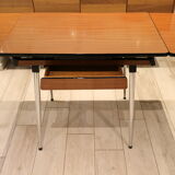 Briwn Formica table with extension cords and drawer