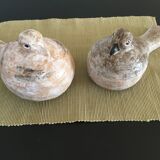Pairs of birds in ceramic signed