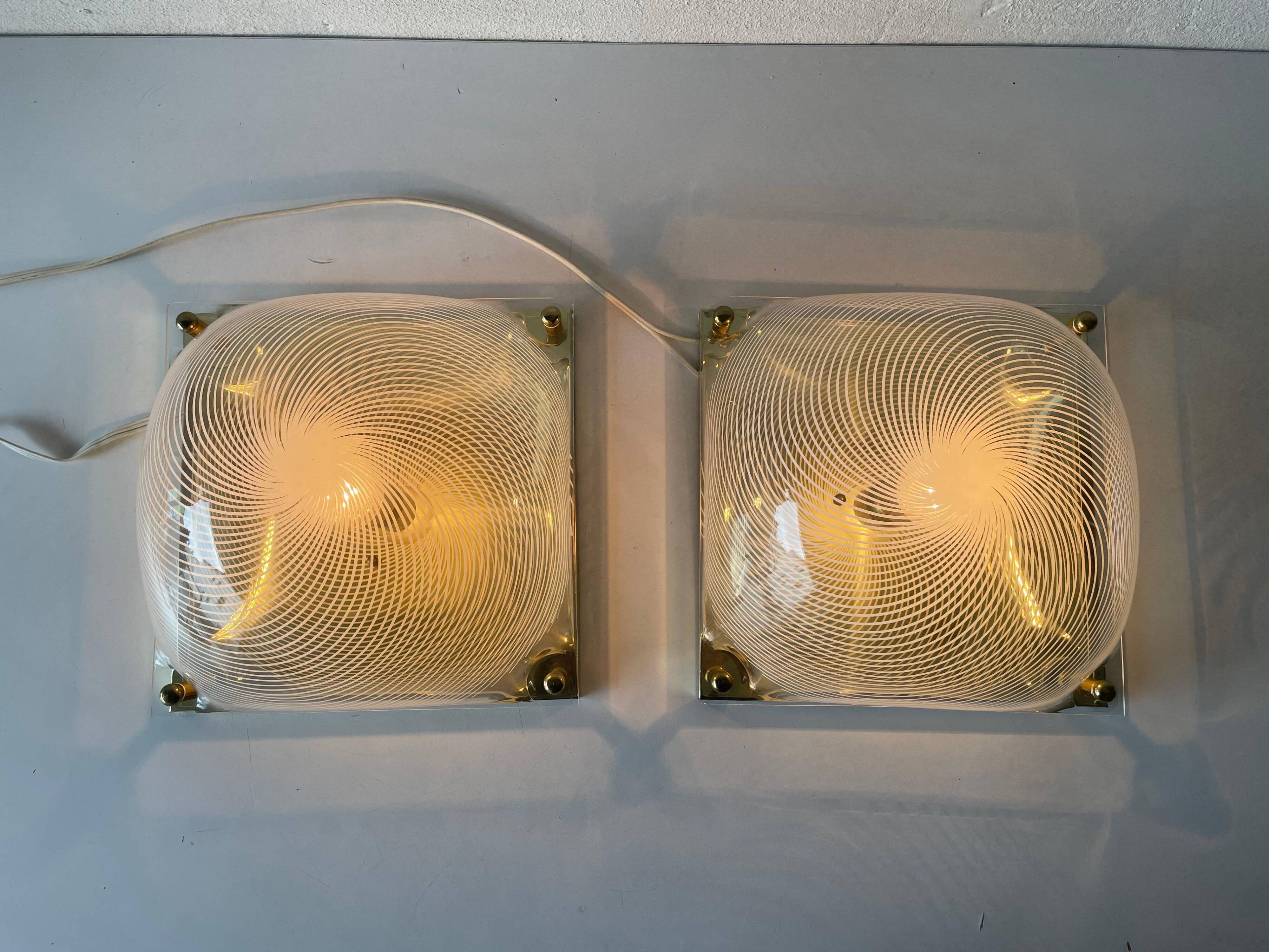 Pair of wall lights or flush mounts in plexiglass by Leola, 1970s, Germany.