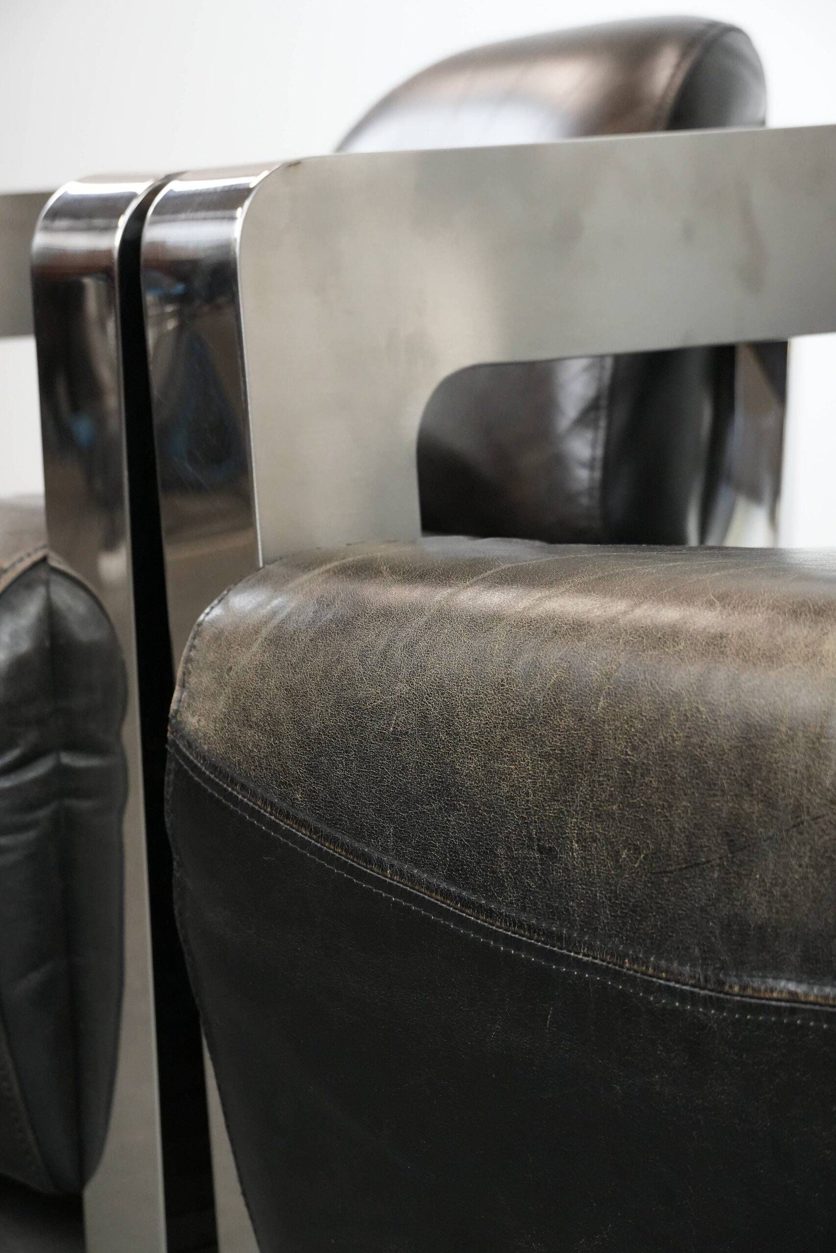 Set of two cowhide leather Aviator design armchairs with aluminium
