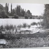 Anonymous film photo river and canoe circa 1970