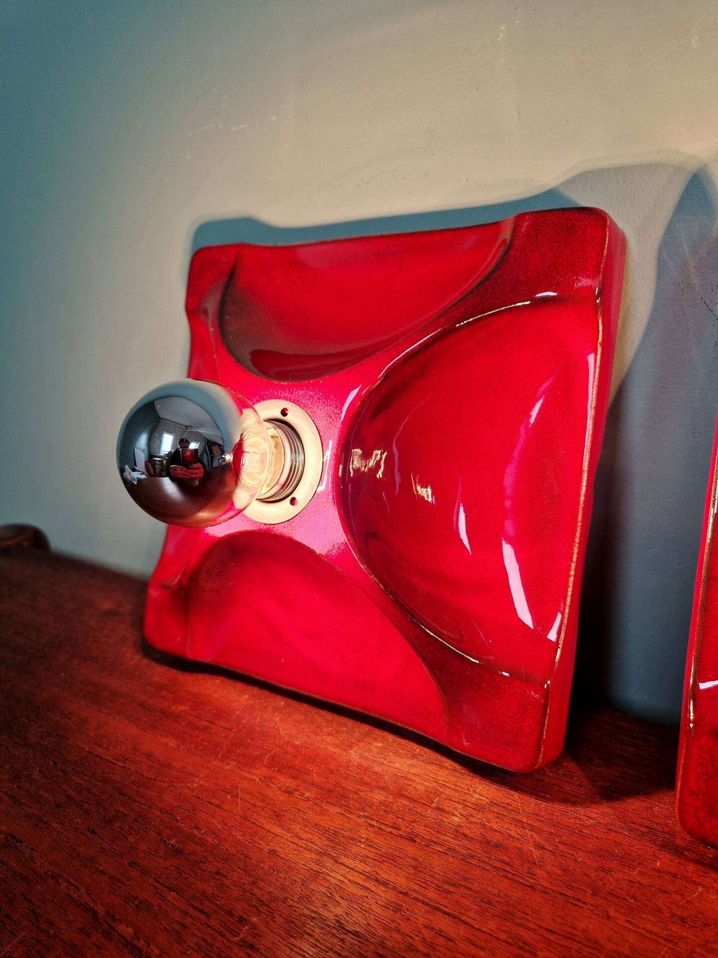Pair of Space Age wall sconces in red ceramic, 1970.