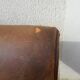 Paire de fauteuils club en cuir marron
