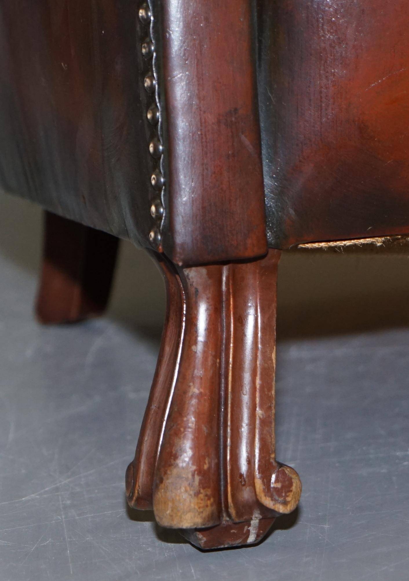 Victorian leather canapé and armchair, barrel back, circa 1860, restored.