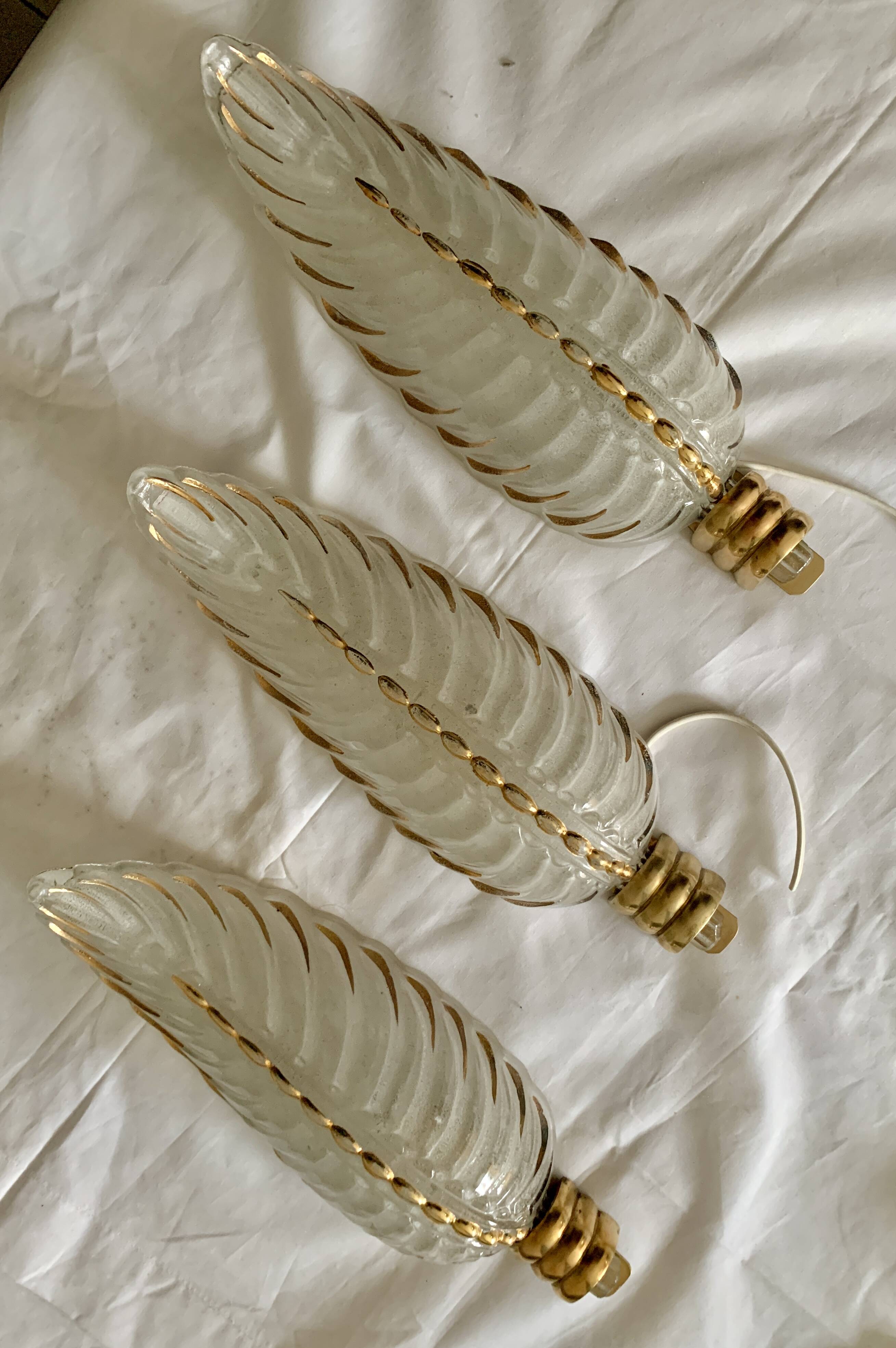 Glass and bronze wall lights from the 40s