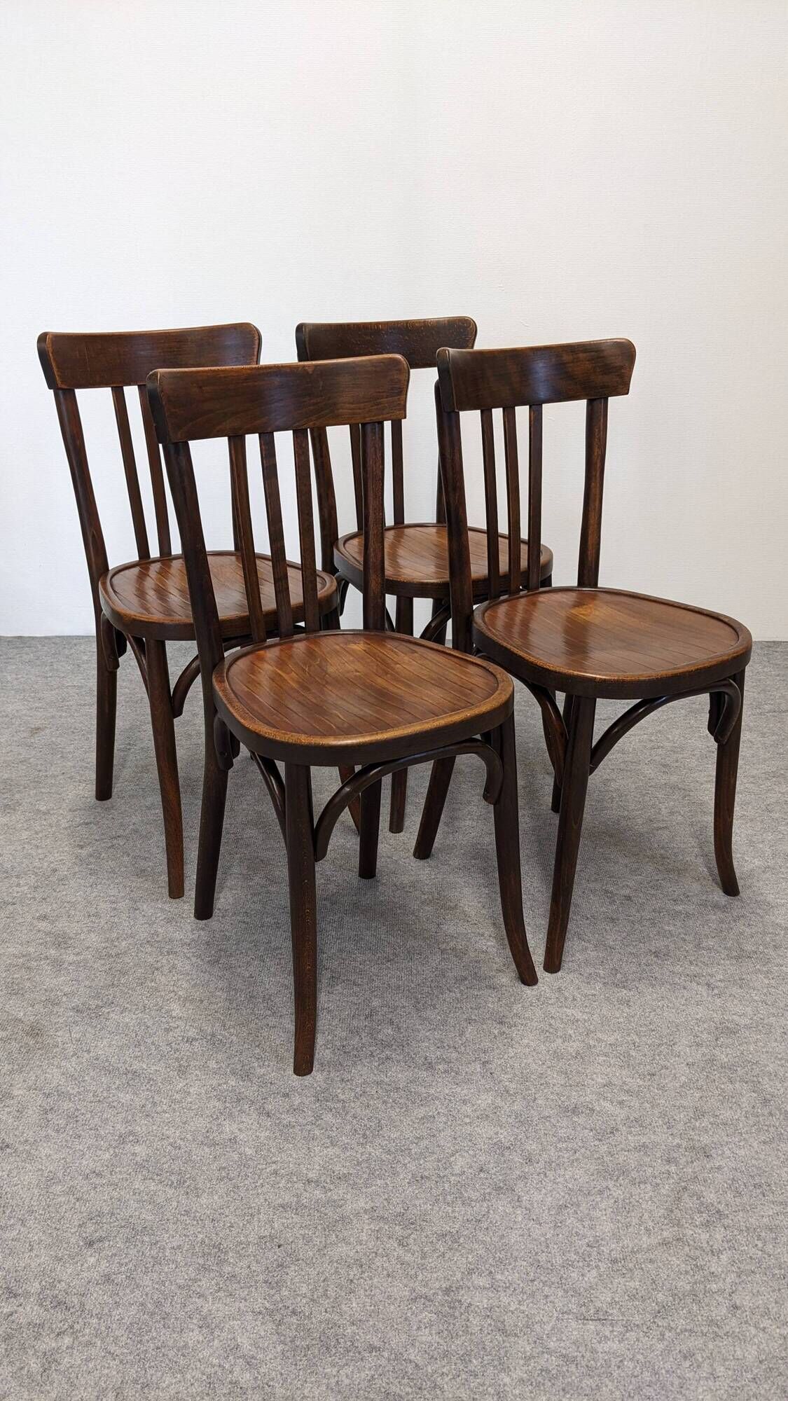Set of 4 Baumann bistro chairs in bent beech, France circa 1930.