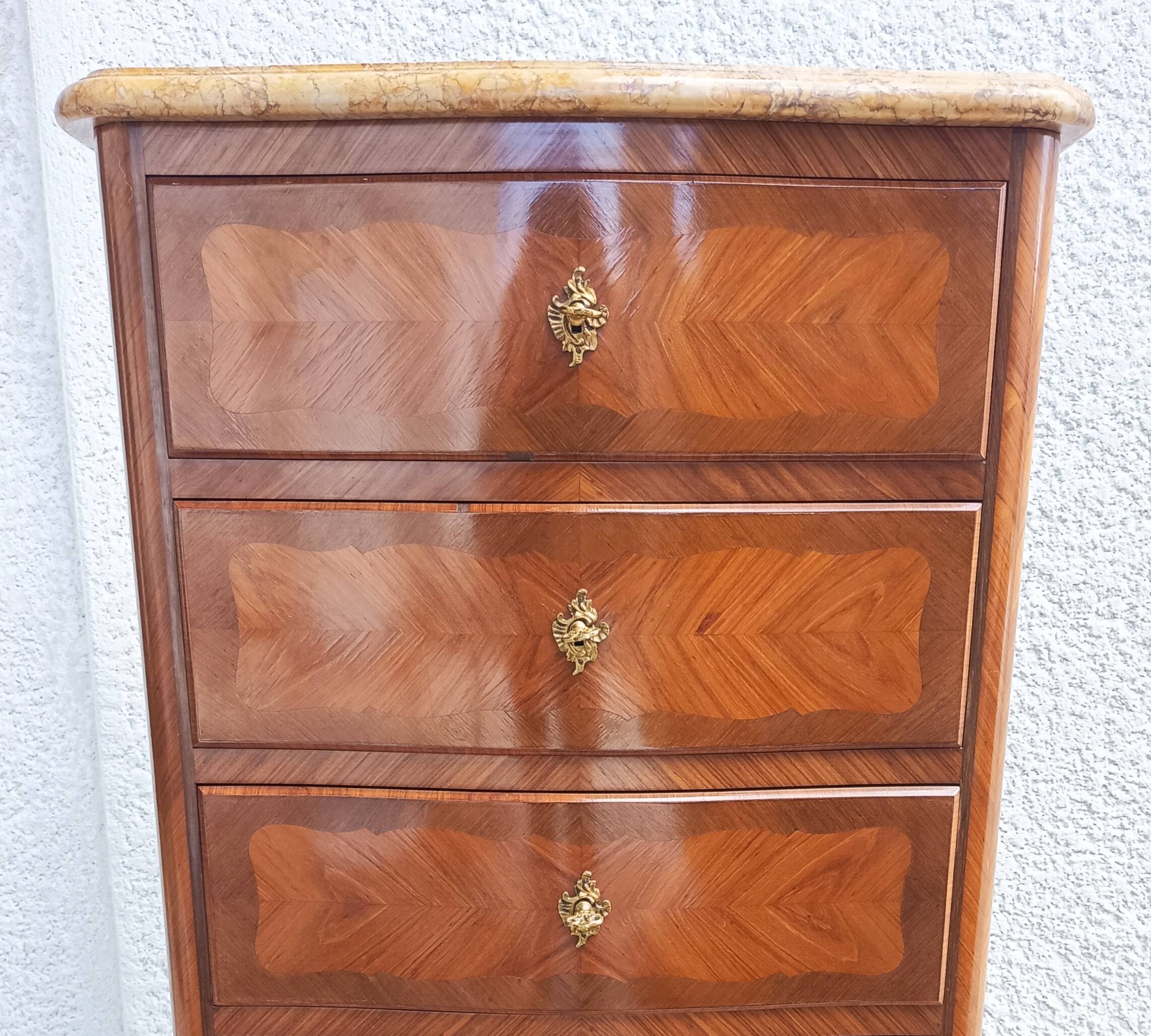 Louis XV style chest of drawers in precious wood veneer.