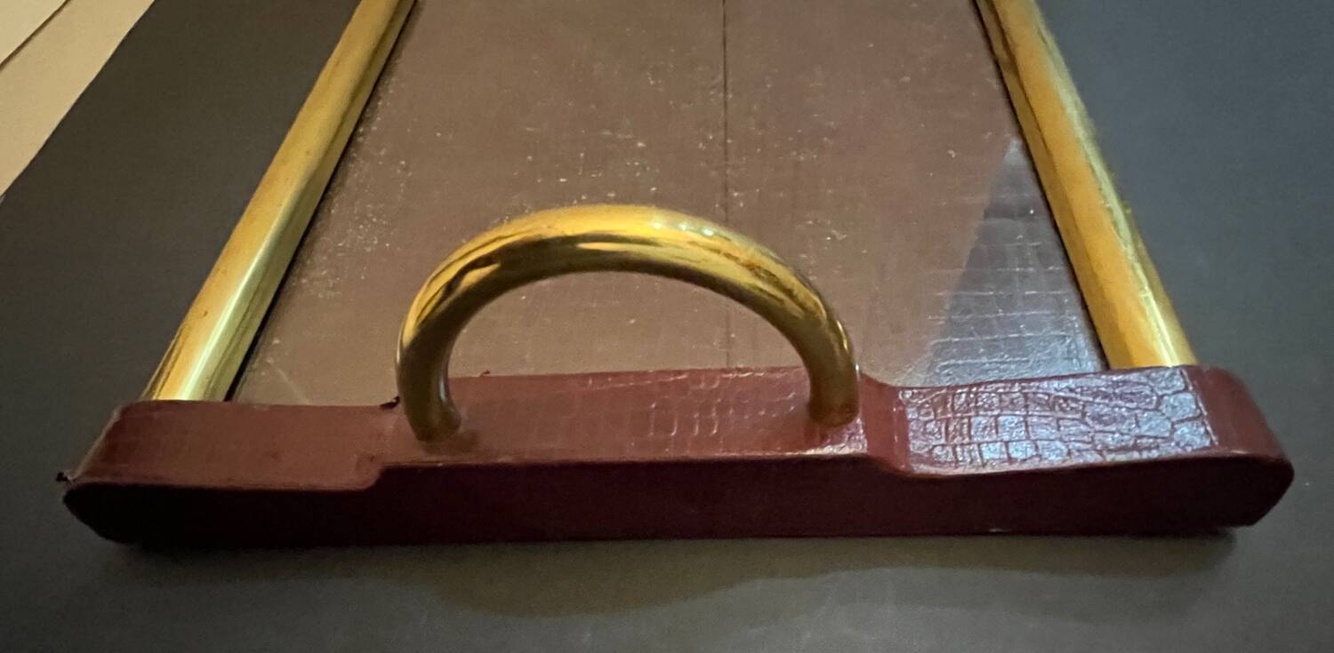 Old leather and gold metal tray