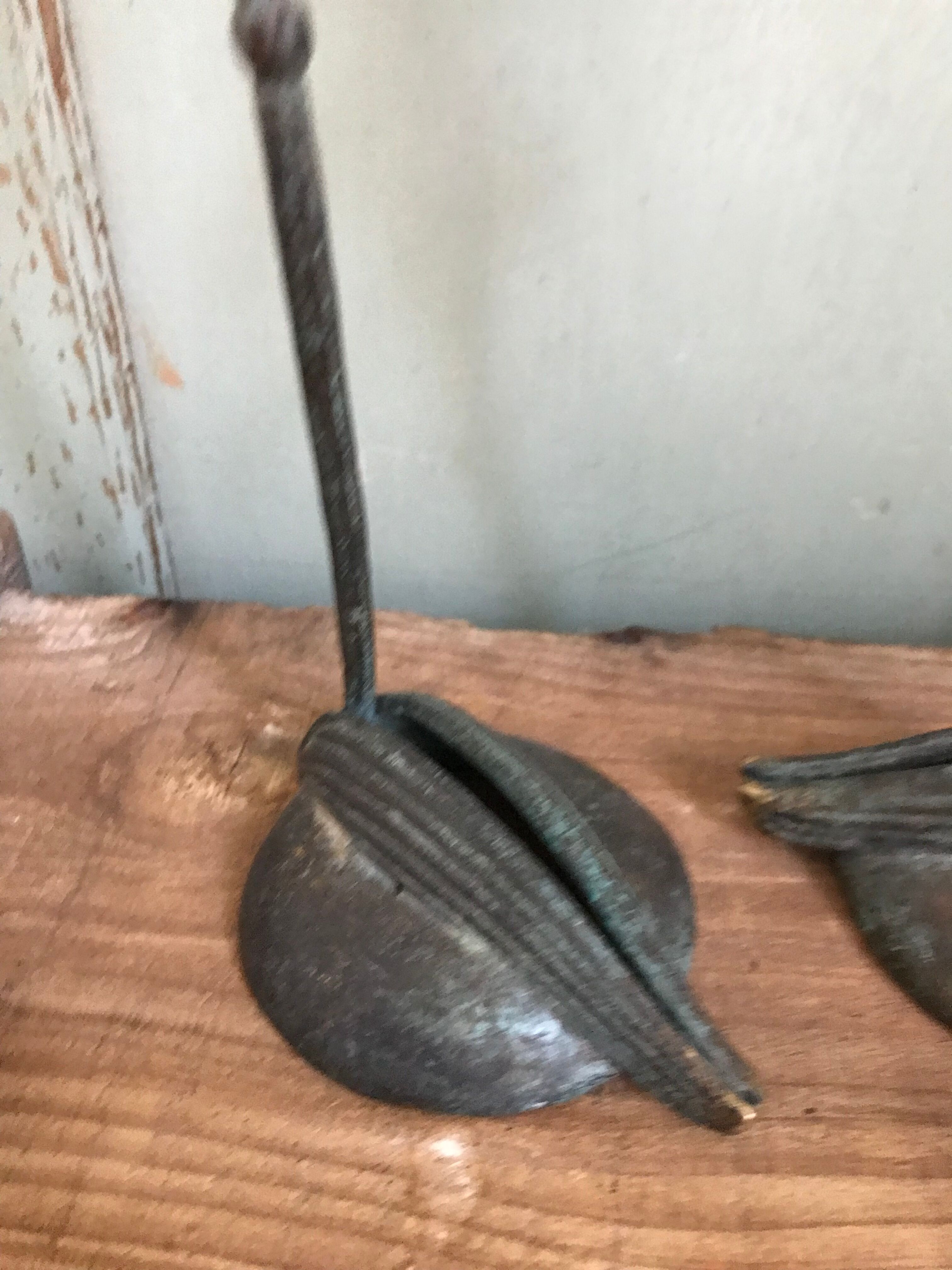 Pair of Iris candlesticks.