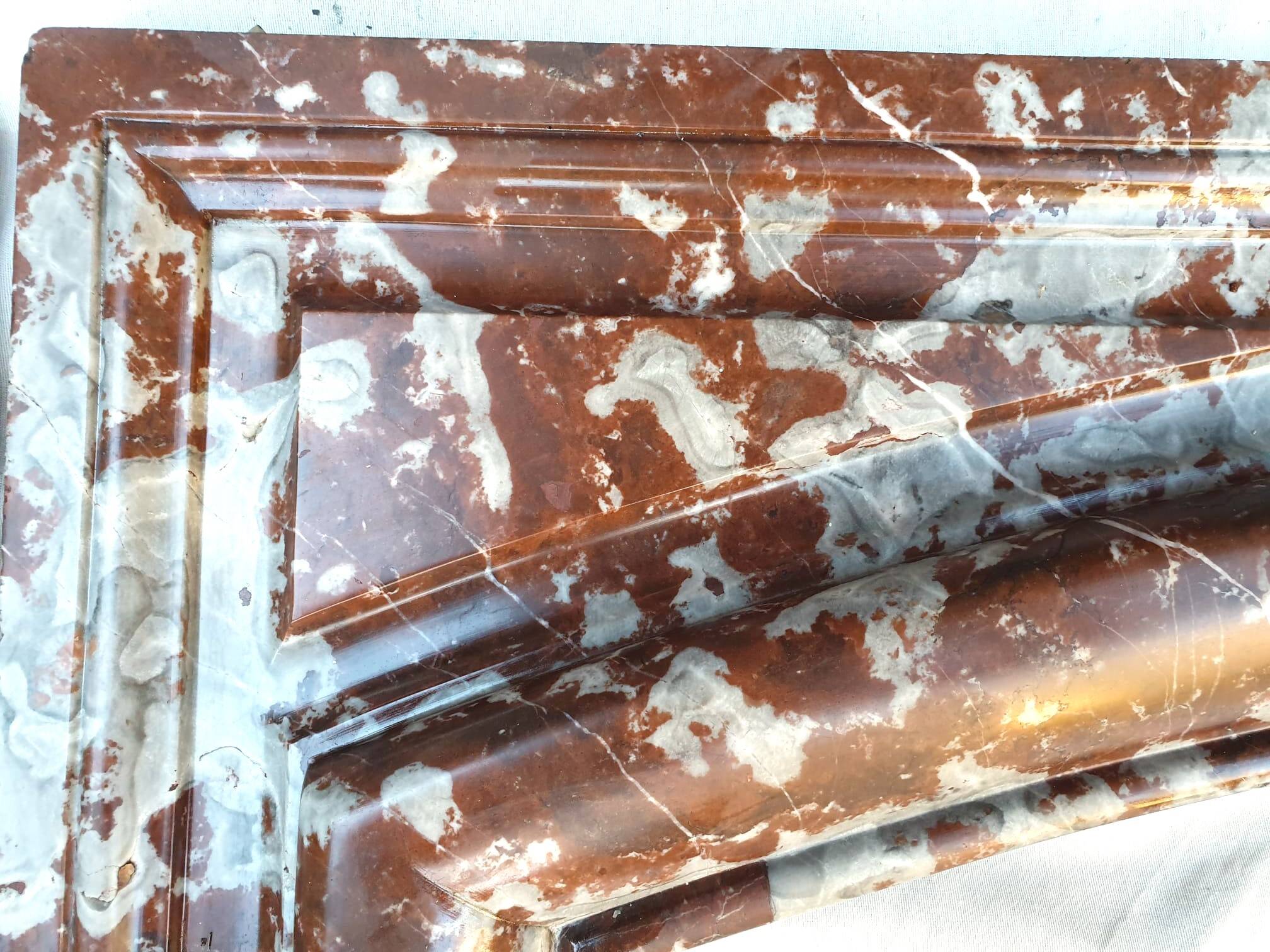 Louis XIV fireplace in Languedoc marble