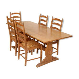 Dining table and 5 chairs of vintage Ercol pine refectory