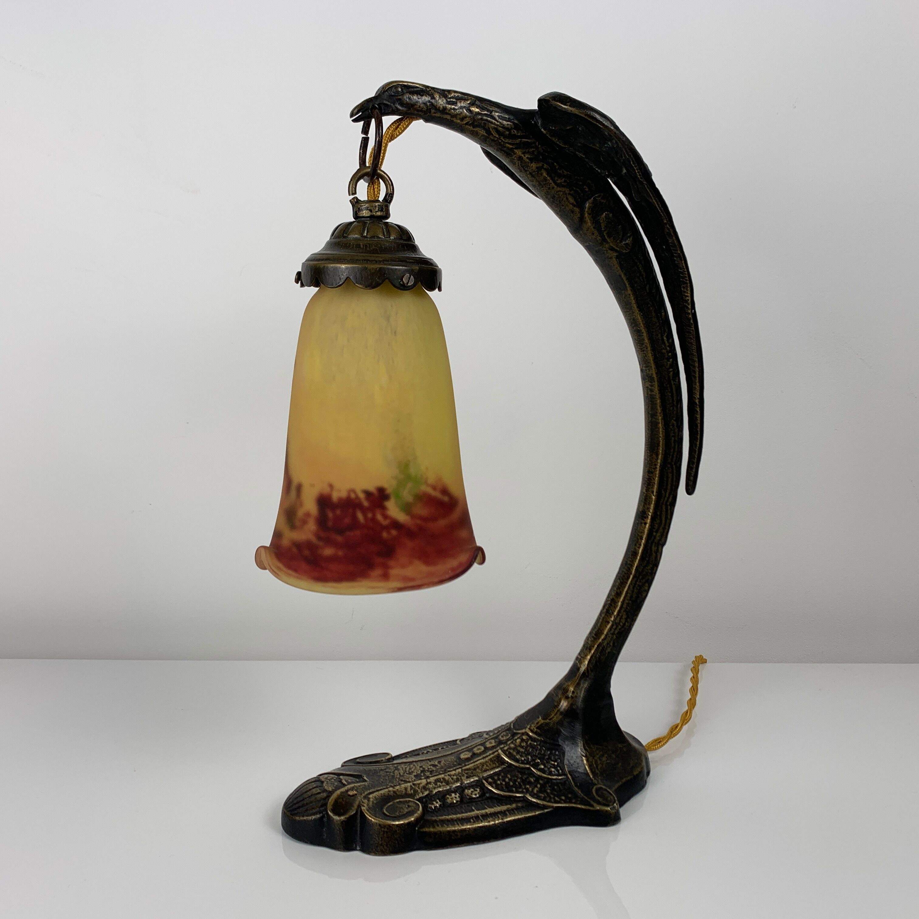 Bronze eagle lamp patinated and Art Nouveau style glass pate