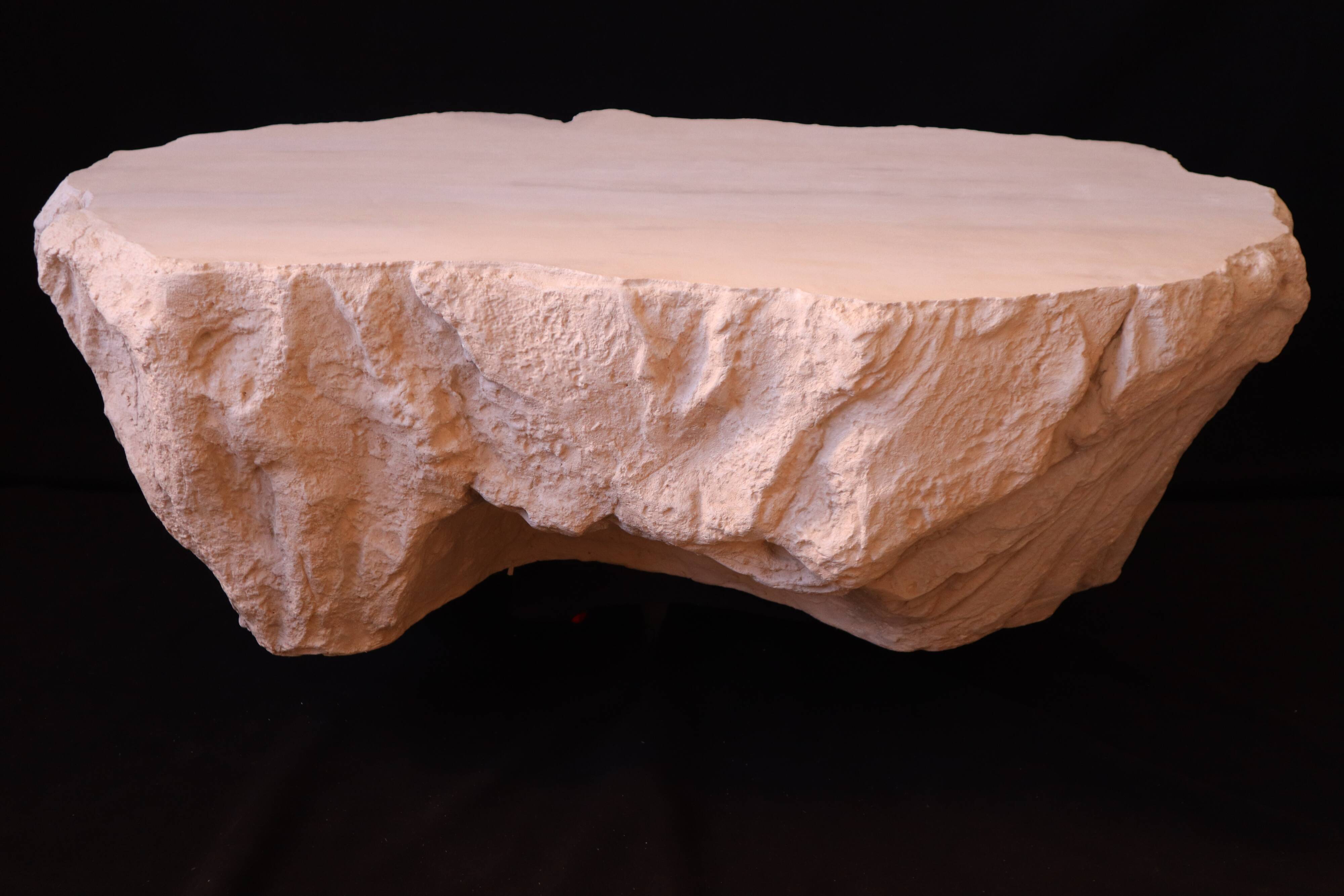 Design coffee table with travertine rock effect — unique piece hand-sculpted.