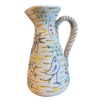 Pitcher with naive bird decor