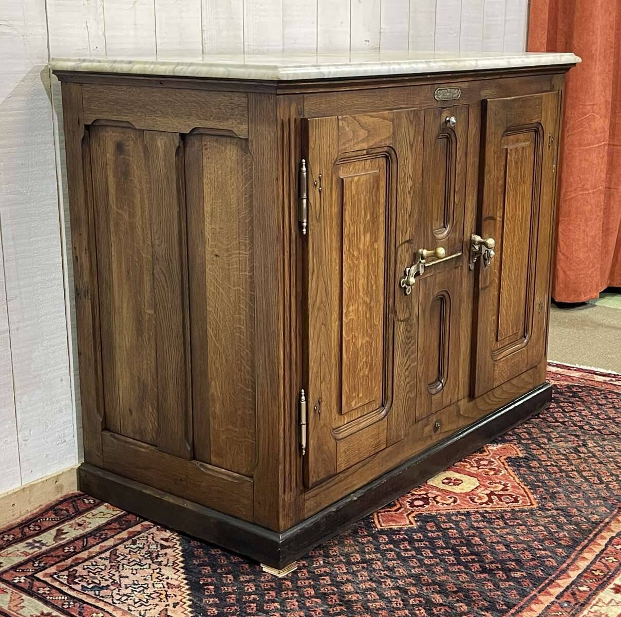 Glacière début XXème en chêne et dessus marbre