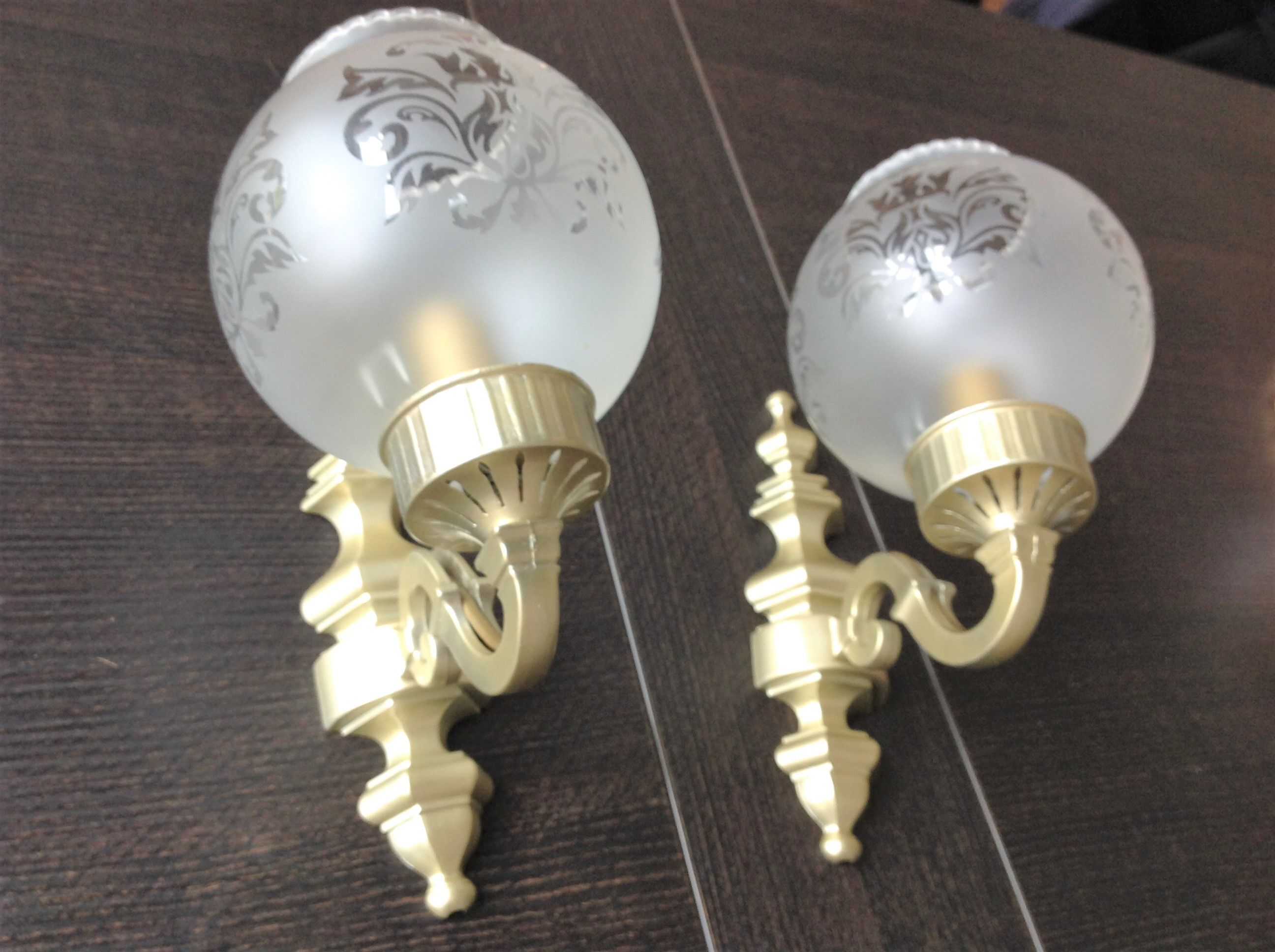 Pair of wall lamps in gilded metal and frosted glass art deco style