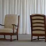 Modern Danish design, a pair of high-backed armchairs in oak and lambswool, 1950s.