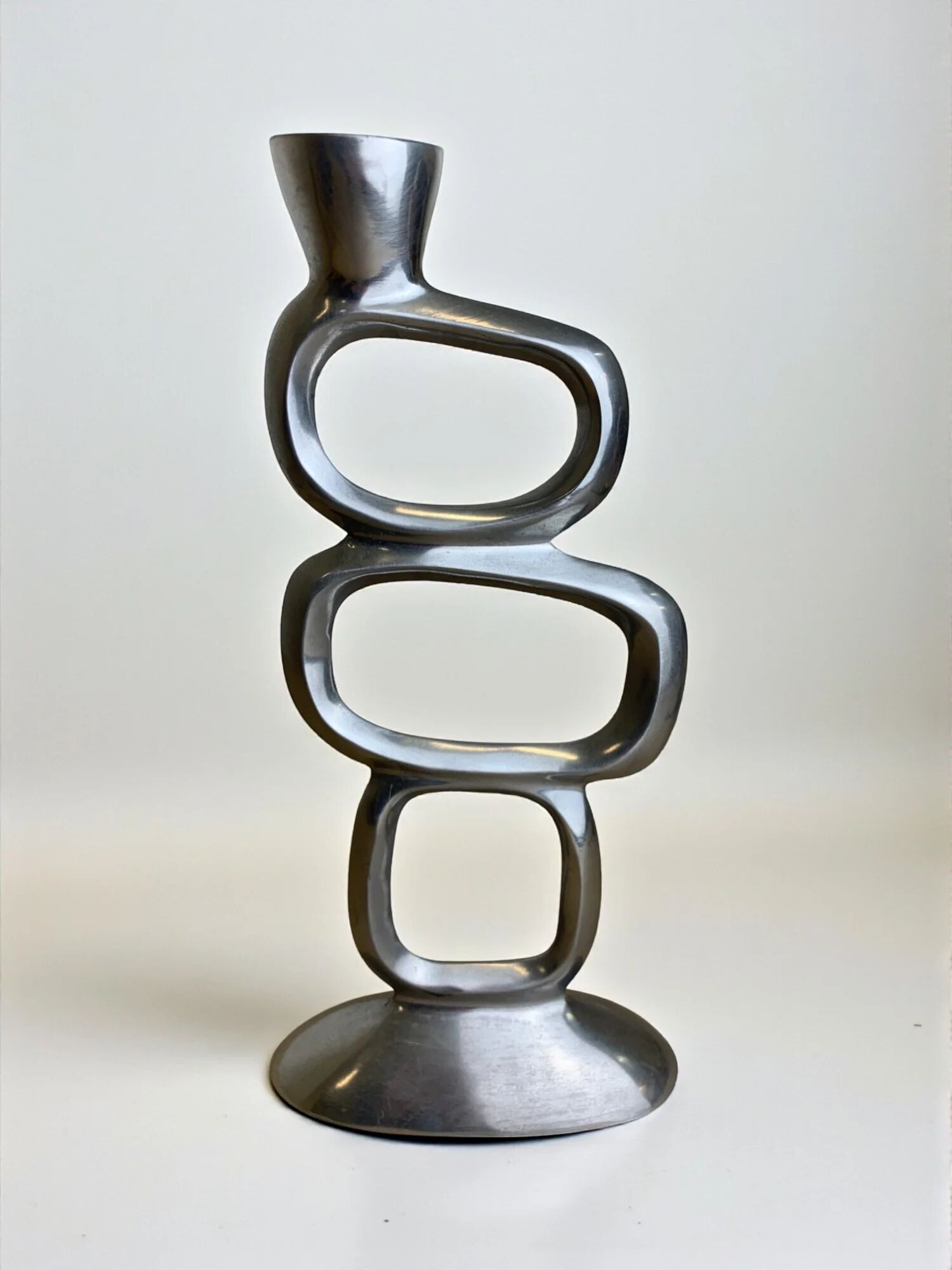 Circle candlestick by Matthew Hilton, solid aluminium, circa 1980s