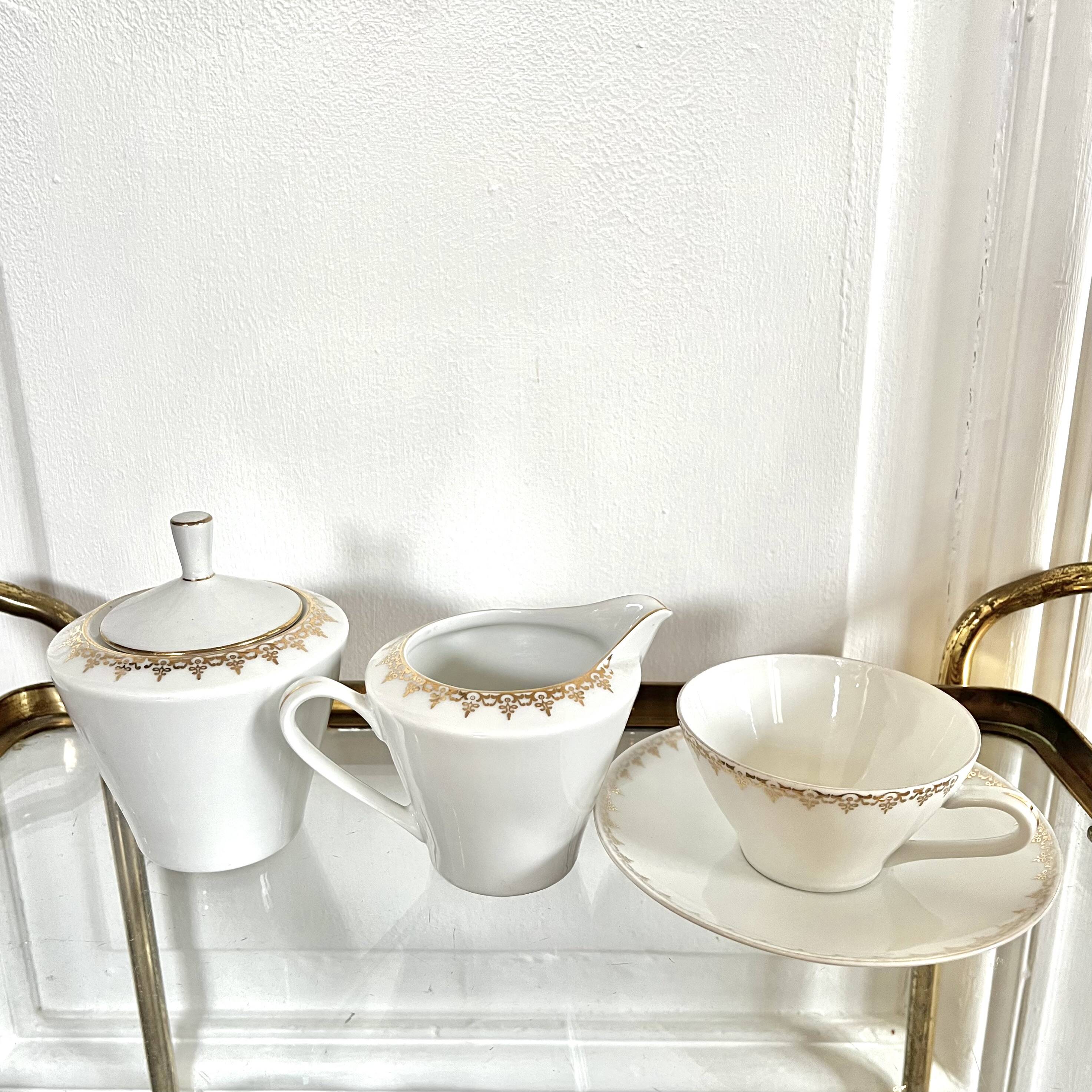 Porcelain sugar bowl and milk jug