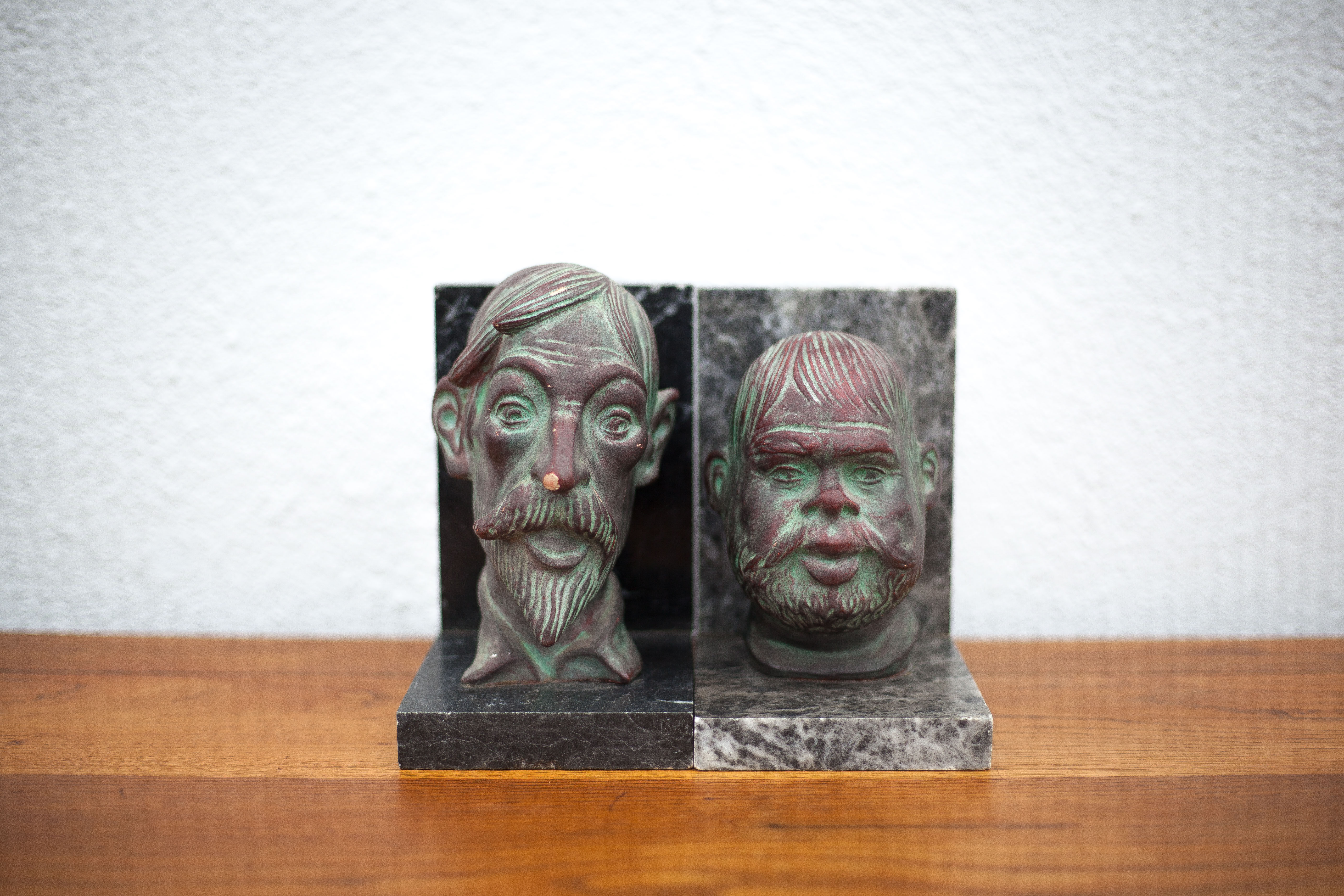 Pair of terracotta and marble bookends, don quixote and sancho panza, paperweight, library