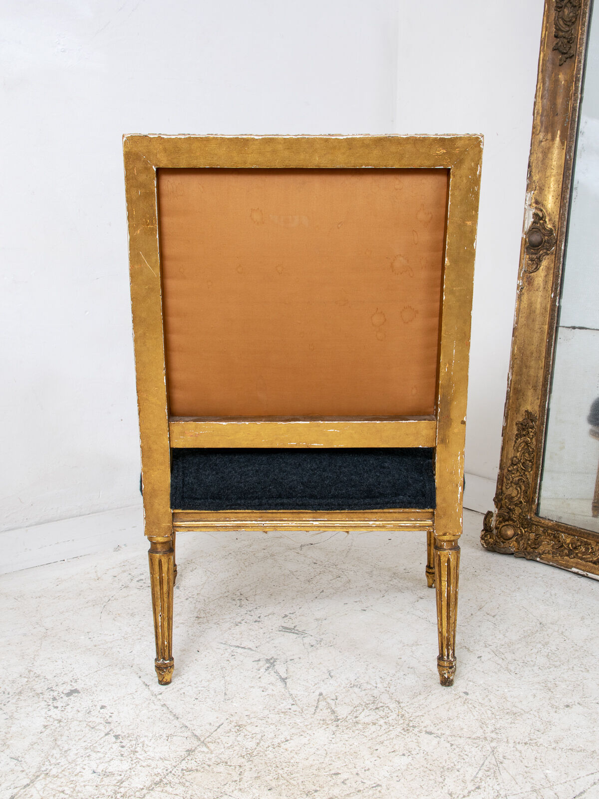Pair of 19th century Louis XVI gilt armchairs newly re upholstered in holland and sherry fabric