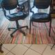 Two black leather armchairs