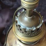 Repoussé brass lamp with floral motifs, decorated with 3 miniature medallions
