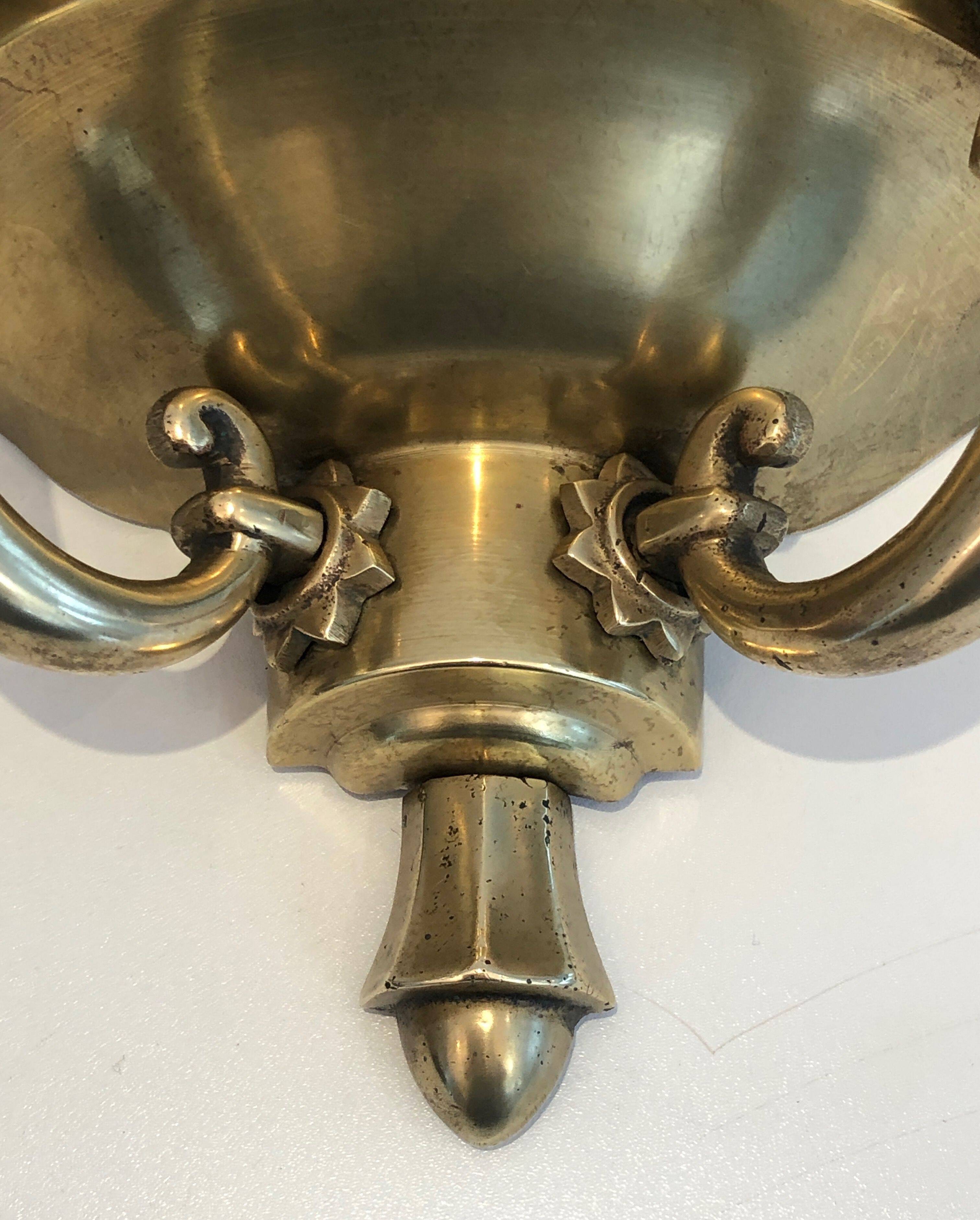 Pair of Art Deco wall sconces in the style of Jules Leleu.