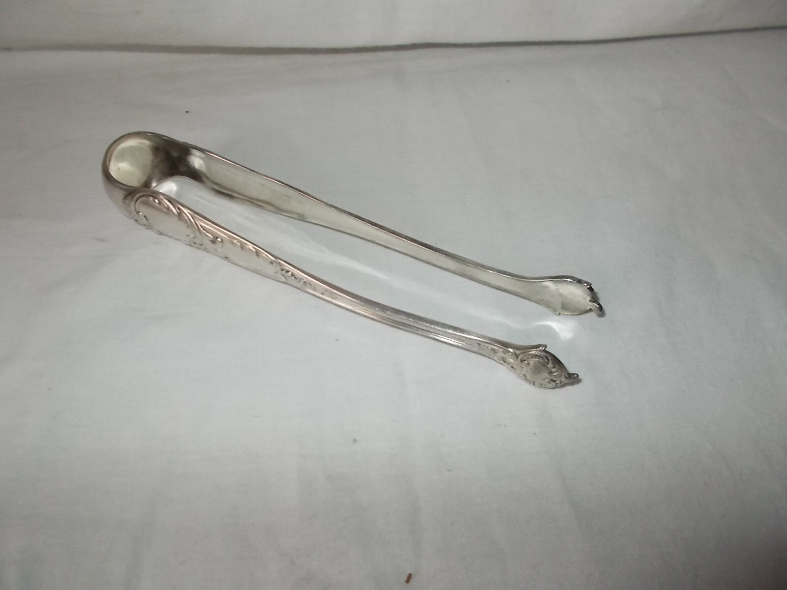 Silver metal sugar pinch