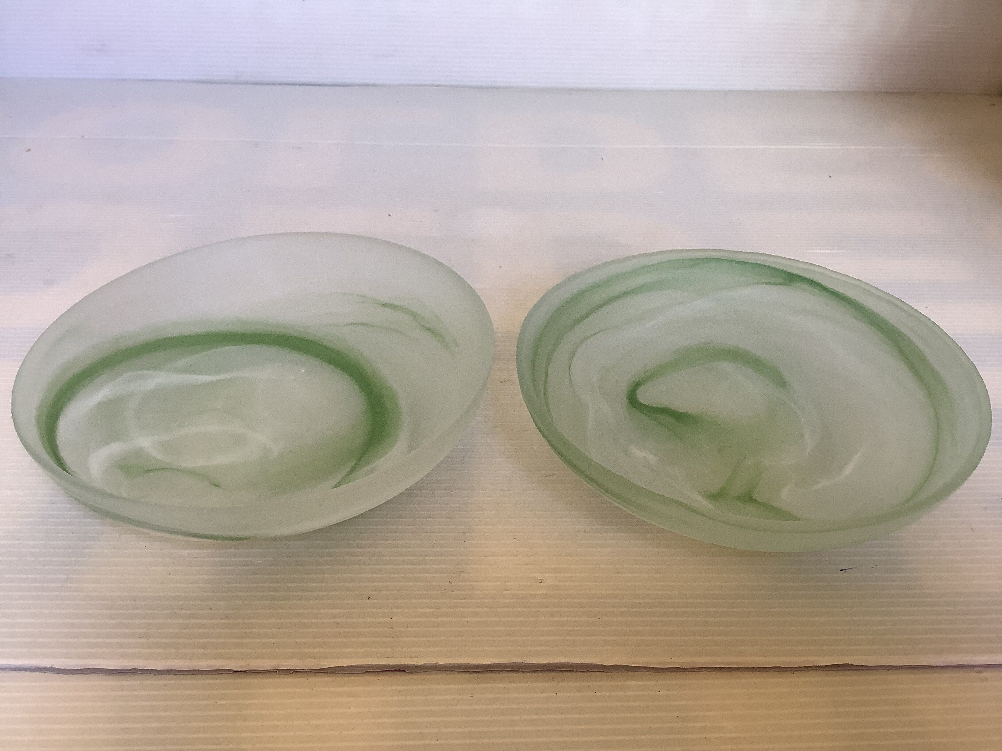 Pair of green glass paste pocket trays