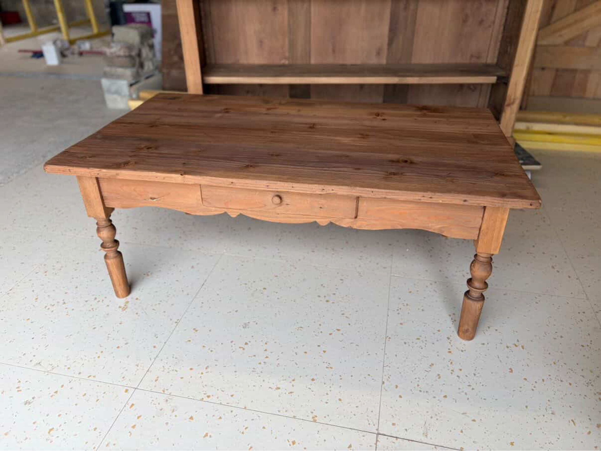 Old wooden farmhouse-style coffee table