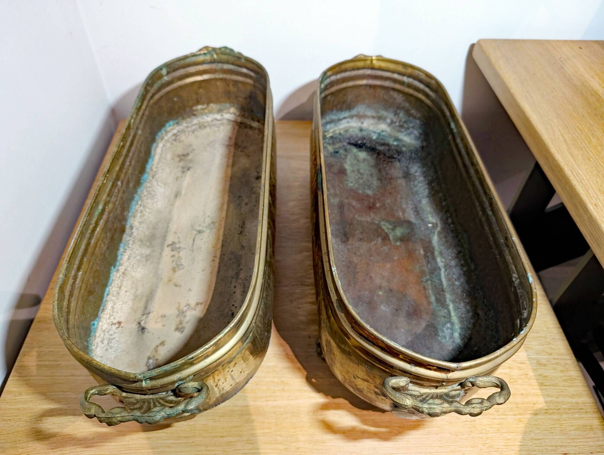 Pair of large antique planters with lion's paw feet.