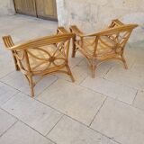 Two large rattan armchairs