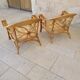 Two large rattan armchairs