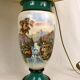 Large pair of 19th century polychrome porcelain vases decorated with landscapes, mounted as lamps