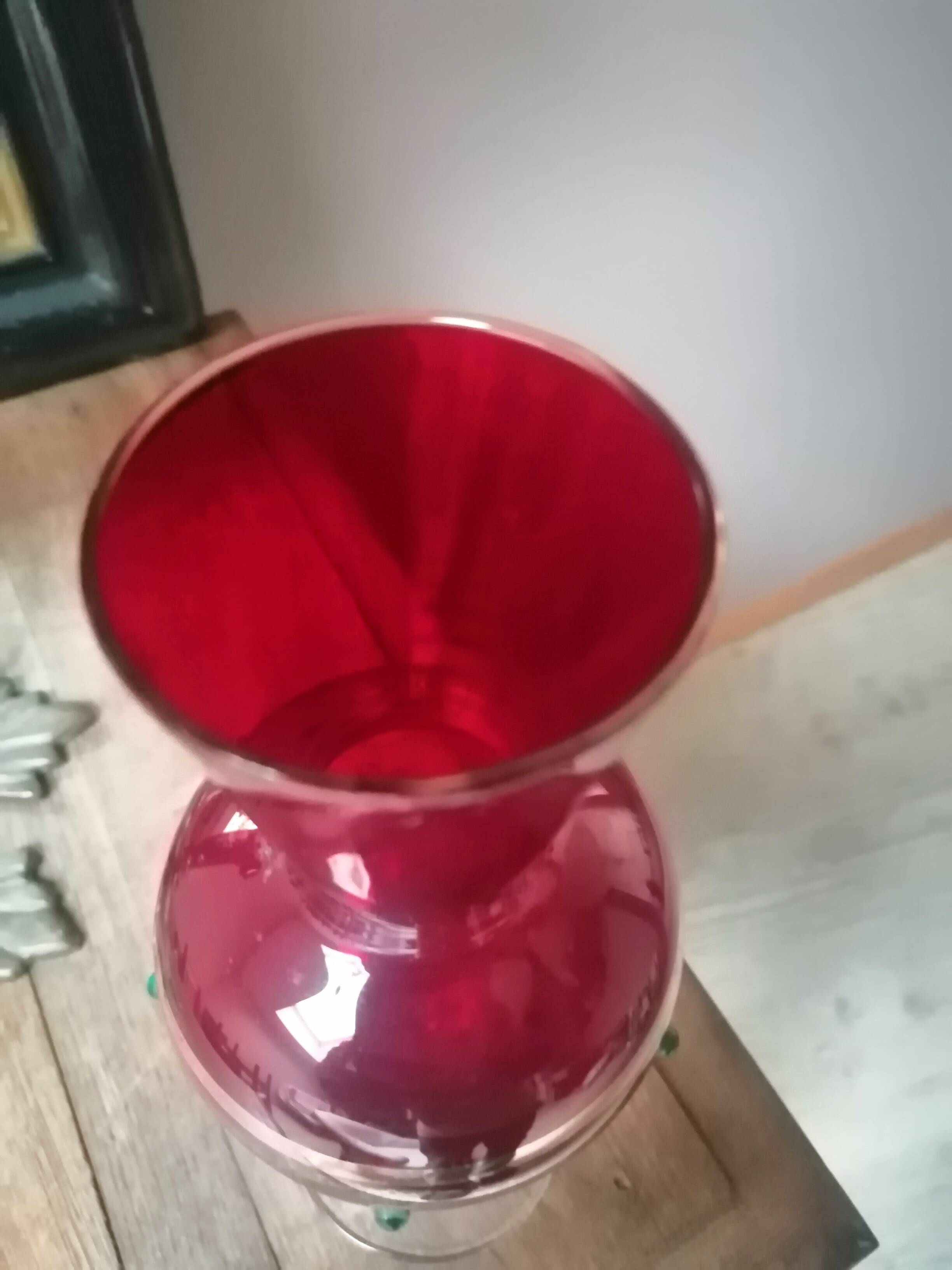 Red vase with gold decoration