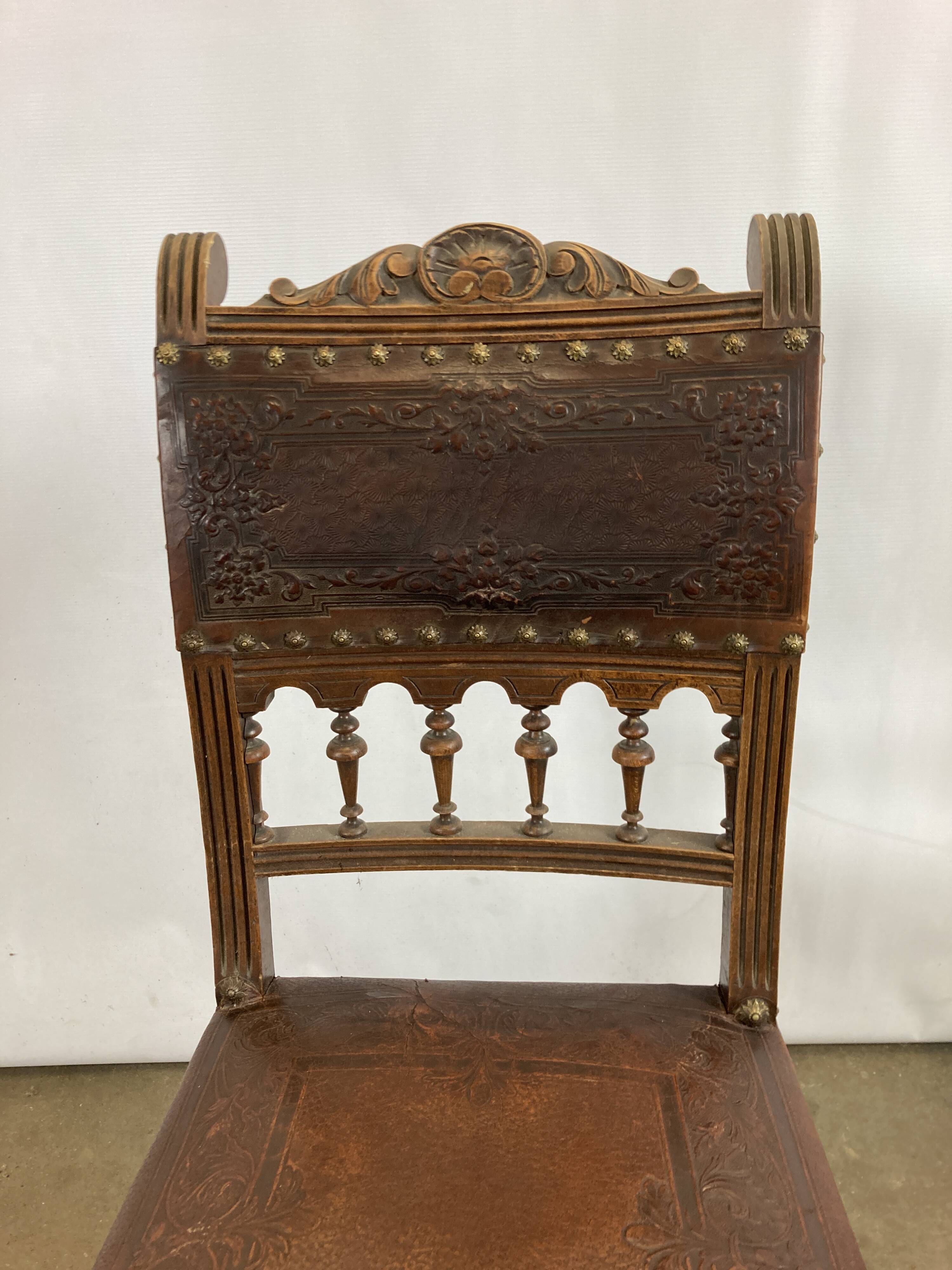 Pair of Henry II wooden and leather chairs