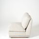 Beige fireside chair by Jacques Charpentier