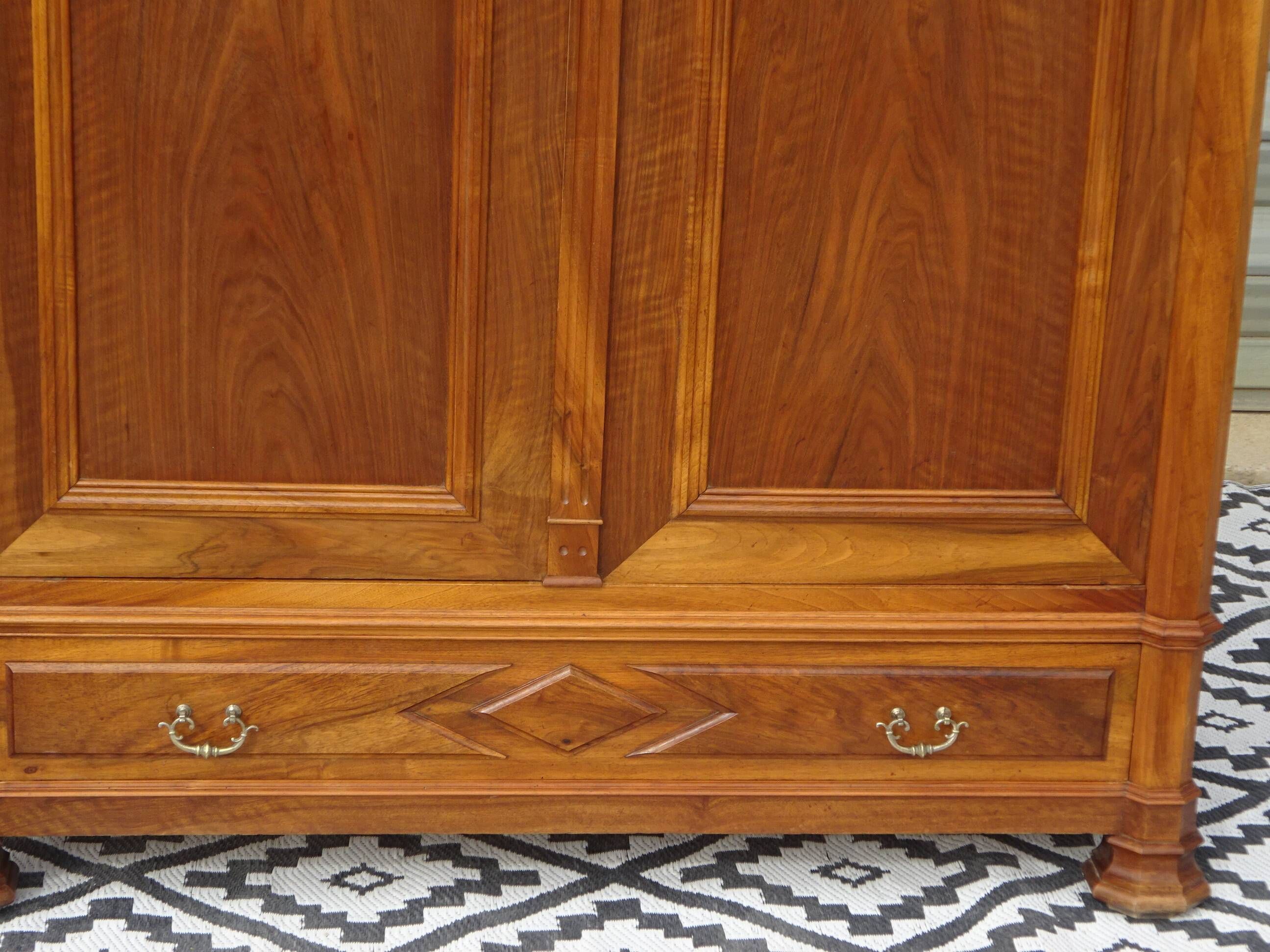 Large antique wardrobe in solid walnut