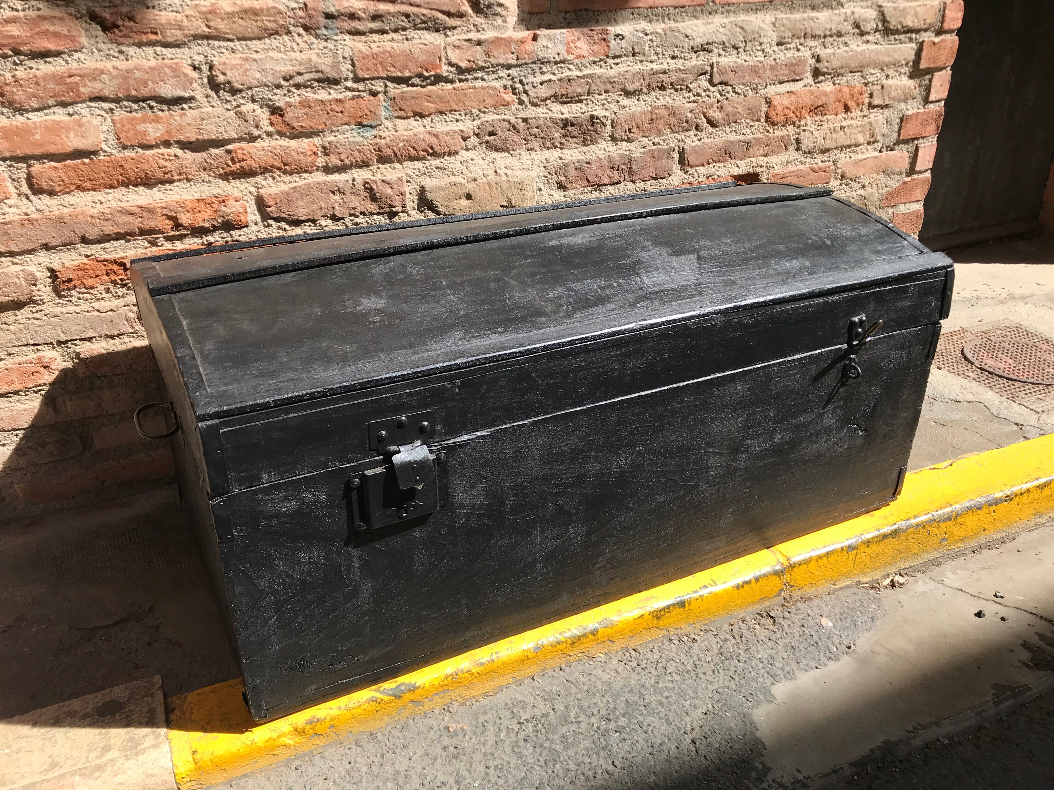 Black wooden trunk