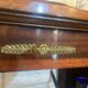 Directoire style bookcase in mahogany, decorated with gilded bronze.