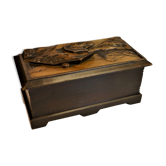 Vintage carved wooden box of a mountain landscape in relief