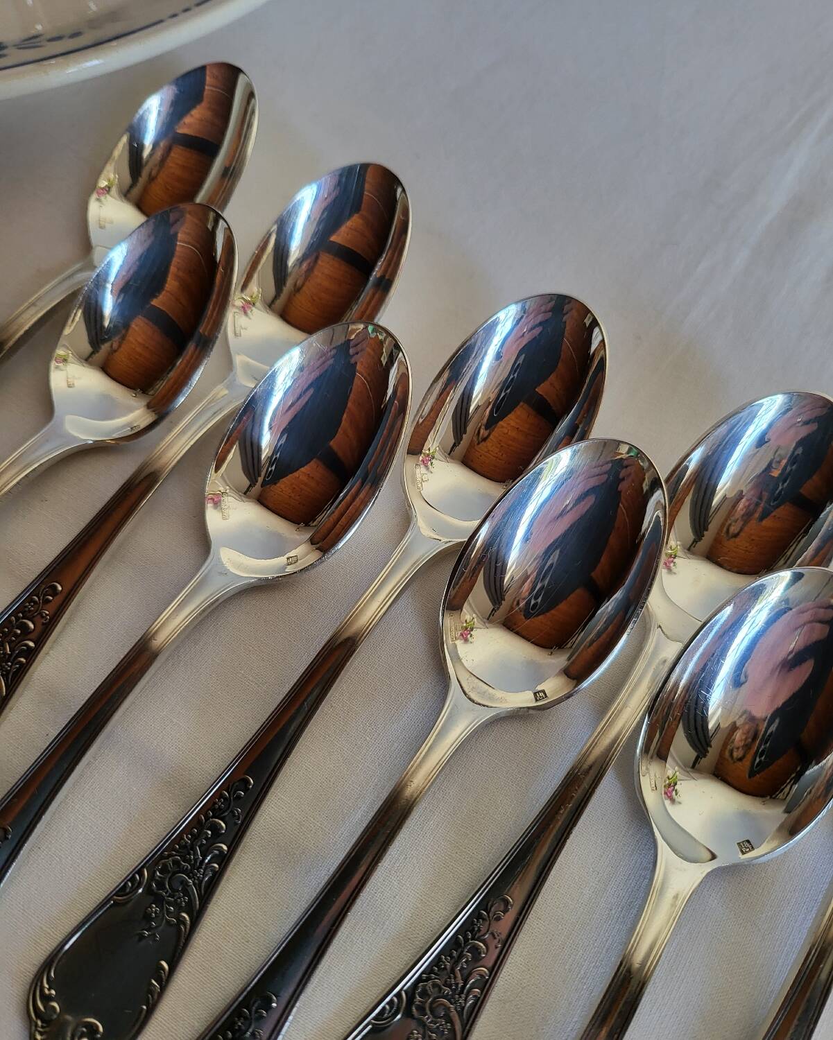 12 small silver-plated metal spoons by Guildart