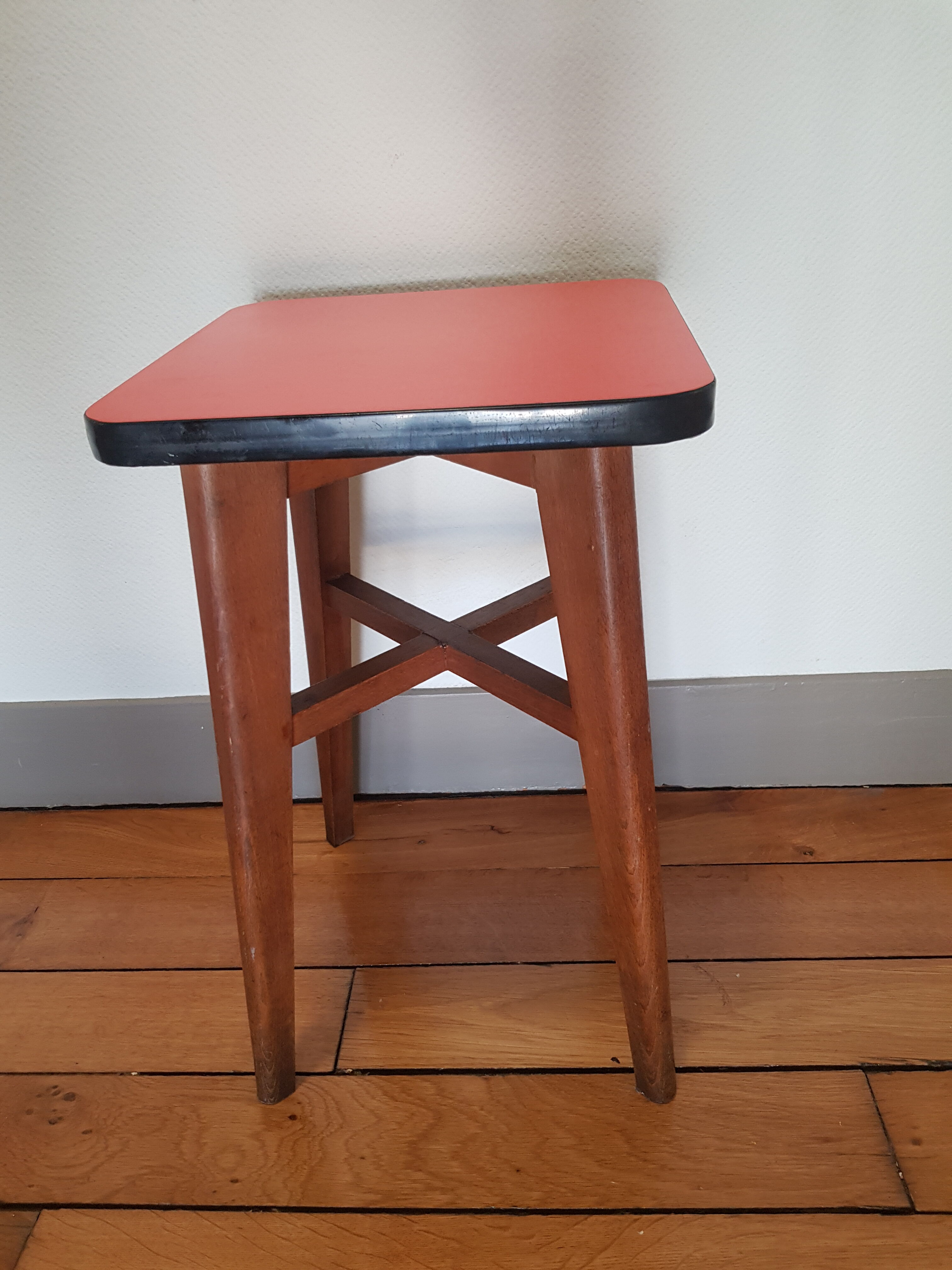 Wooden and red formica stool