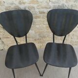 Pair of chairs with tapered metal legs and black Skaï, 60s