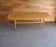 Vintage coffee table in maple and brown beech, surfboard style, with integrated magazine rack.