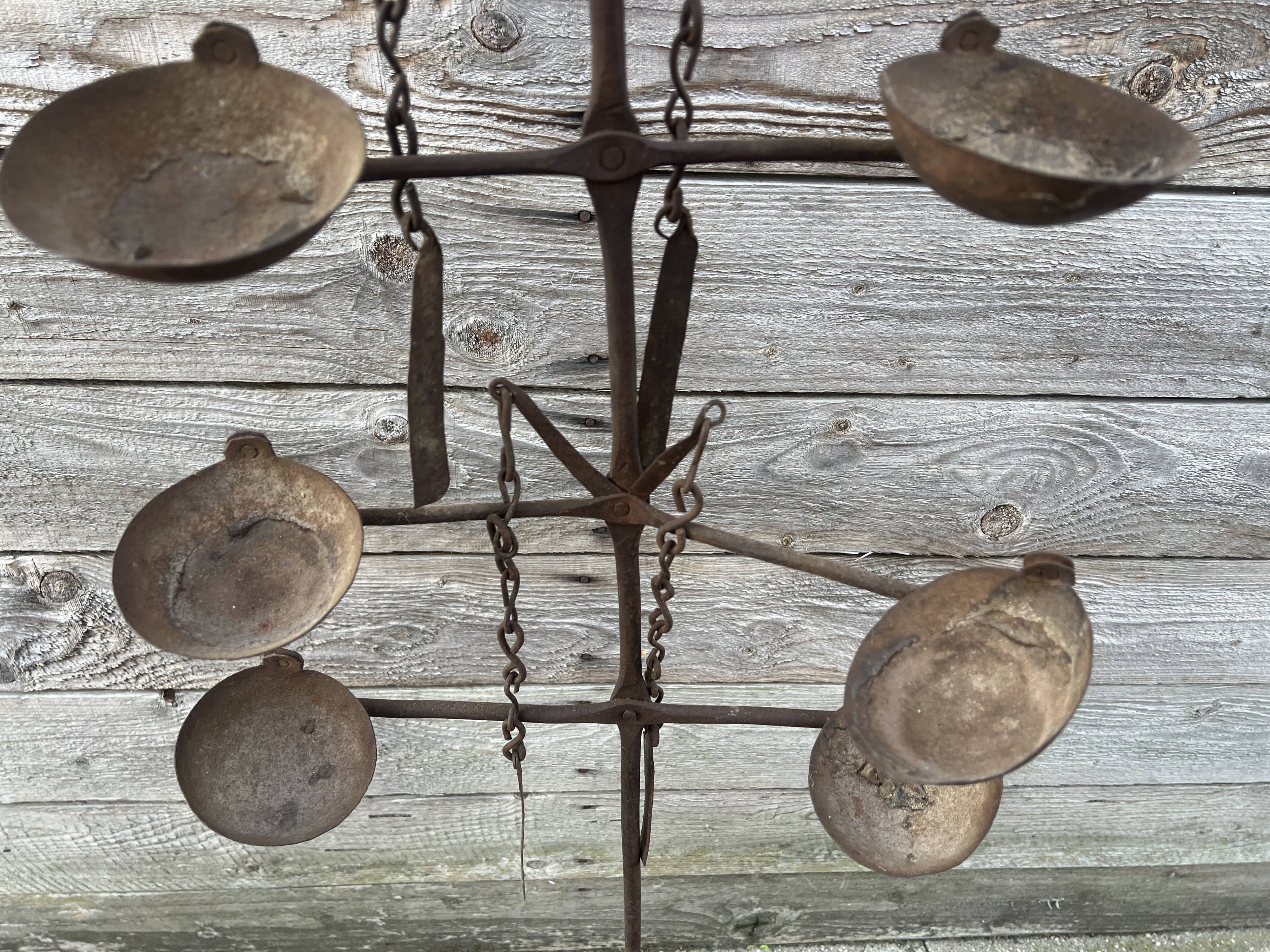 African oil lamps on stands