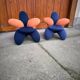 Pair of Lily chairs from the 1990s in blue and coral velvet, postmodern sculptural silhouette.