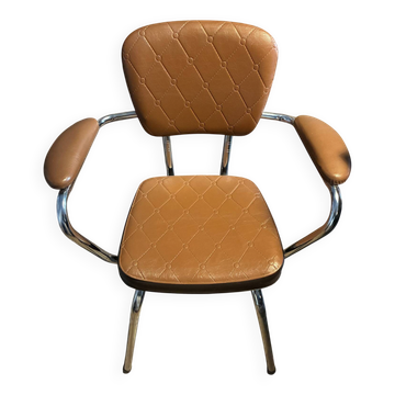 Armchair with armrests from the 70s in Skai and chrome.